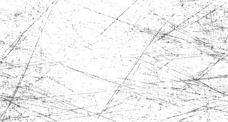 Fototapeta premium white surface covered in numerous thin, dark grey scratches and speckles creating a distressed texture.