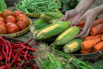 A vibrant display of fresh vegetables at a bustling market, showcasing natures bounty and promoting healthy choices