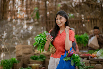 A joyful and happy young woman is happily shopping for fresh produce at a vibrant, bustling local market