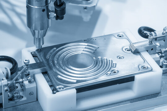 The hard disk assembly process by automatic screw driver in the blue tone scene.