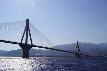 Forest Fires and smoke by the Rio - Antirio Bridge Charilaos Trikoupis in the Greek Mediterranean Sea
