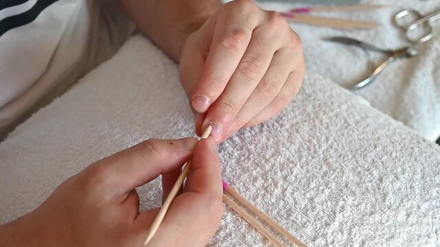 Man Manicure &ndash; Pushing Back Cuticles with Wooden Cuticle Pusher