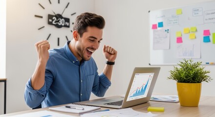 A smiling man celebrates success while reviewing data on his laptop in a modern office. Colorful sticky notes and a plant suggest a collaborative workspace.