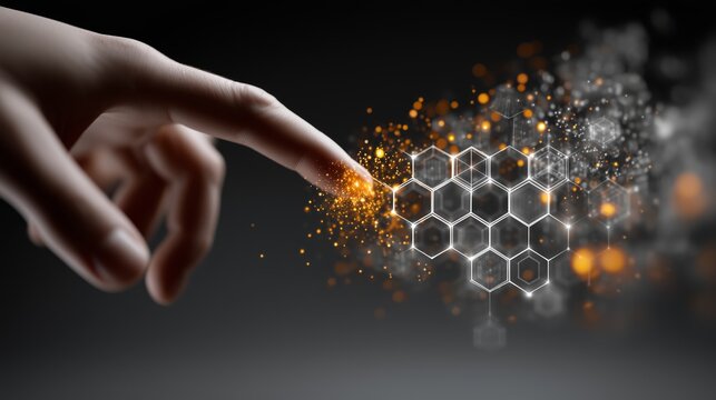 Human finger touching glowing hexagonal digital interface