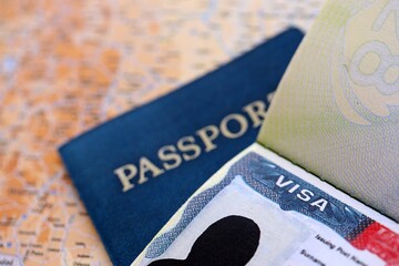 USA visa background. US visa in passport on United States geographical map