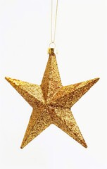 Golden Star ornament hanging in studio, holiday decorations, for web and design