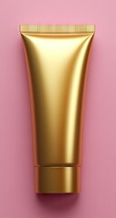 Golden tube of cream/gel on pink background