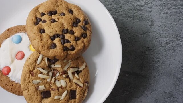 Cookie on Rotating Plate, Showing Detailed Crumbly Texture, Golden Brown Surface, and Sweet Delicious Appearance of Gourmet Dessert