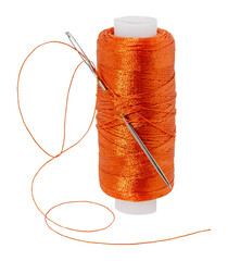 Old spool of thread and needle on a white background. Sewing accessories