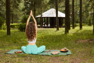 Experience serene meditation in nature, incorporating yoga and calming music for a holistic retreat