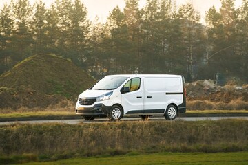 Modern freight vehicle driving in nature