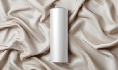 Elegant White Cylinder on Smooth Beige Silk Fabric Background