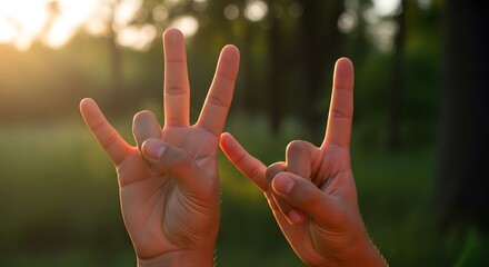 Gesture for peace in sign language with warm light