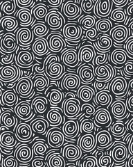 A seamless abstract pattern featuring whimsical white swirls on a black background..