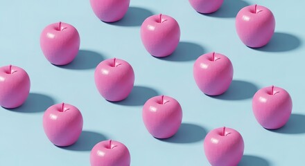 Pink painted apples arranged in a grid pattern against a light b
