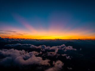 Beautiful and Colorful Sunset above the clouds in the Austrian alps