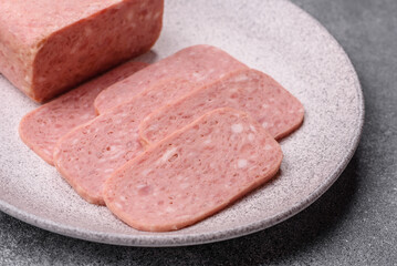 Spiced ham slices, canned meat for lunch sandwiches. Spiced ham as a food background