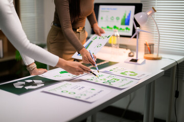 Businesswomen analyzing ESG strategy for corporate sustainability development