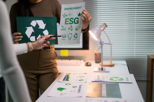 Businesswomen discussing ESG strategy planning for corporate sustainability