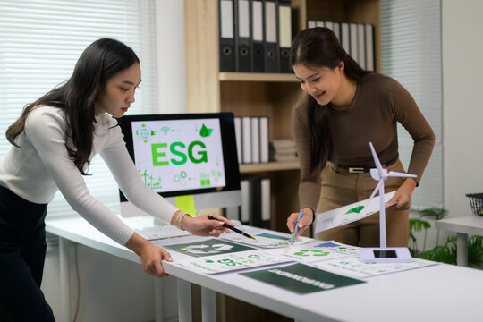 Women collaborating on ESG strategy and environmental sustainability