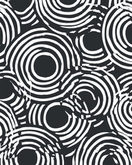 Fototapeta premium Abstract black and white pattern featuring circular designs and swirling lines for modern decor..