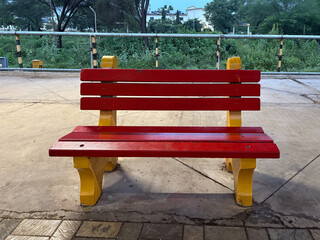 a precast concrete bench, also known as an RCC (Reinforced Cement Concrete) garden bench. The bench is designed for outdoor use, such as in parks or gardens. 