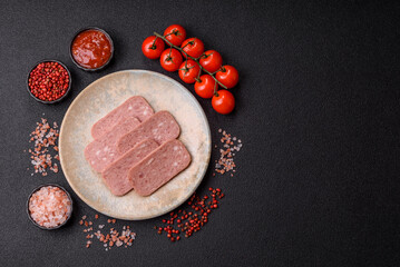 Spiced ham slices, canned meat for lunch sandwiches. Spiced ham as a food background