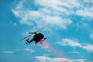 A military helicopter pilot demonstrates his professional skills