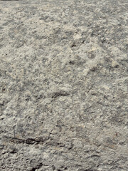 Beige and grey marble surface with rumpled natural patterns, perfect for luxury textured backgrounds.