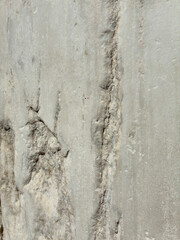 Authentic Greek marble column closeup with natural crevice detail, ideal spa and design background.