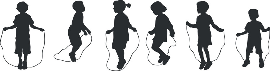 Silhouette of children joyfully jumping rope showcasing energy and playful outdoor activity..