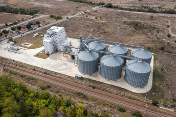 Aerial view to a metal silos for grain drying. Agricultural industry