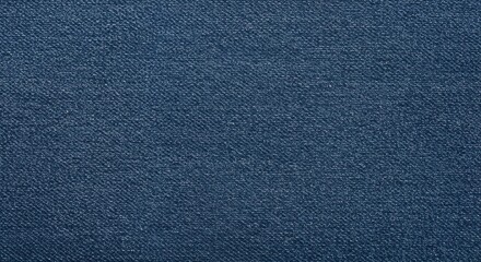 Detailed Close-Up of Deep Blue Denim Fabric Showing Texture and Weave Patterns