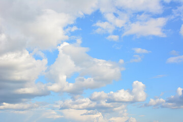 a blue sky covered with white clouds wallpaper