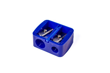 Two hole Pencil sharpener isolated on a white background. Manual blue pencil sharpener