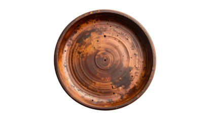 Overhead shot of brown, rustic, ceramic bowl with concentric rings