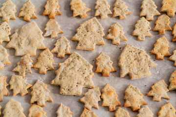 Homemade Christmas tree cookies flatlay pattern background