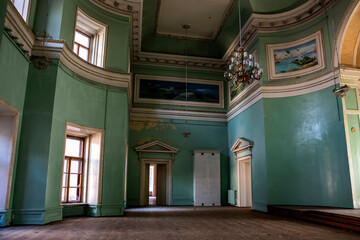  hall in a huge abandoned palace. The interiors of an abandoned 18th-century palace. Beautiful...