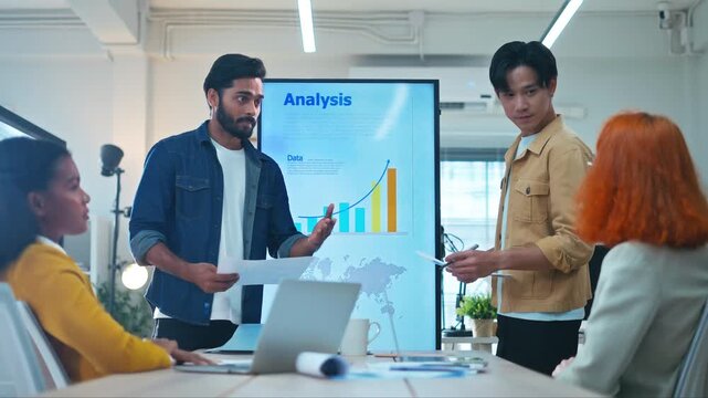 Group of young creative multiethnic business team brain storm meeting presentation,discussing roadmap to product launch, planning,strategy,new business development,working with new startup project