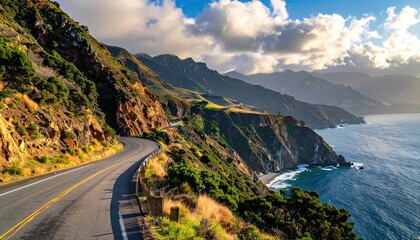 Coastal Road Winding Through Green Rocky Cliffs Under Bright Sky with Blue Sea in Sunny Day