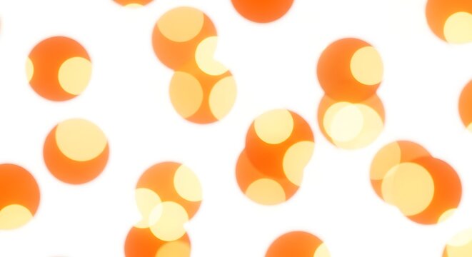 Outoffocus orange circles with yellow spots are randomly scattered across a white background - Powered by Adobe