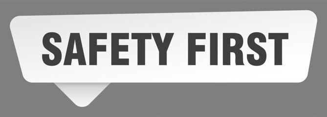 safety first sign. safety first white sticker isolated on gray background