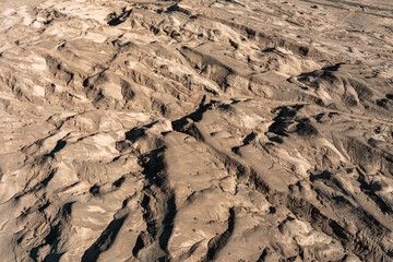 Aerial View of the Austere Northwest: Textured Patterns of Wind-Eroded Landscapes in the Gobi Desert Mountains