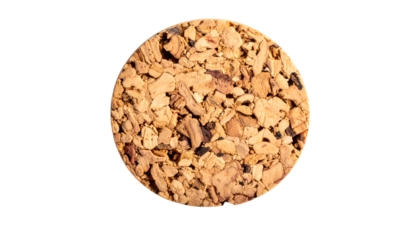 Close-up of a circular cork, revealing detailed texture & natural patterns