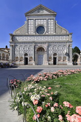 Roses frame the Renaissance facade (Gothic side portals), Santa Maria Novella Basilica finished by...