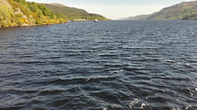 Low flight over Loch Ness, famous lake in Scotland, United Kingdom