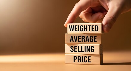 Hand stacks wooden blocks spelling out weighted average selling price