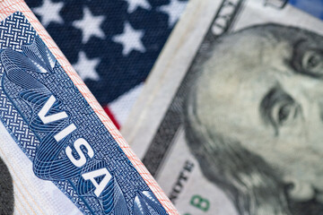 hundred dollar bill and a visa on the background of the US flag. The concept of travel and freedom.