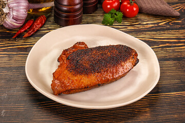 Roasted duck breast in cherry