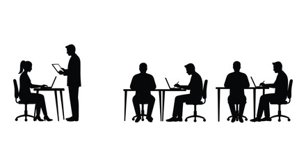 People working on laptops at desks a distinct black silhouette